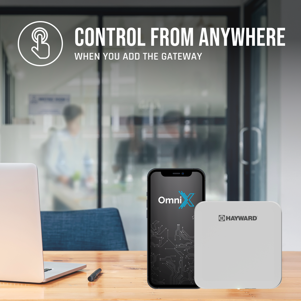 A Pool Goods Super Pump VS 620 with OmniX 2.25 HP and gateway device sit on a desk, showing how easily you can control your variable speed pool pump from anywhere by adding the OmniX Gateway for smart pool automation.