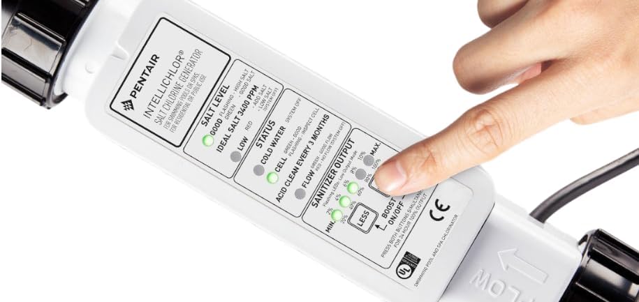 A finger presses a button on the Pentair IntelliChlor control panel to effortlessly manage pool sanitization with the trusted Pentair IntelliChlor IC40 Cell Salt Chlorine Generator (EC520555).