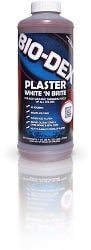 A 32 oz bottle of BioMINUSDex Plaster White 'N Brite for Acid Wash (PWB32) stands upright with a red and black label, featuring a biodegradable formula.