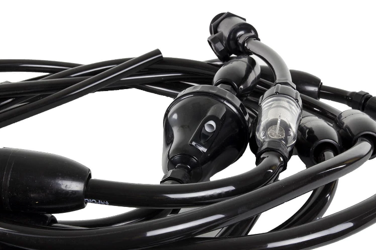A set of black rubber hoses with connectors, coiled and entangled, perfect for Polaris Vac-Sweep 280 Black Max pressure side pool cleaner systems.