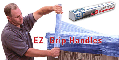 A man uses handles to wrap blue Gladon Winter Cover Wrap (15" x 500') around an outdoor object for pool winterizing; a box labeled "Gladon" is visible in the top right corner.