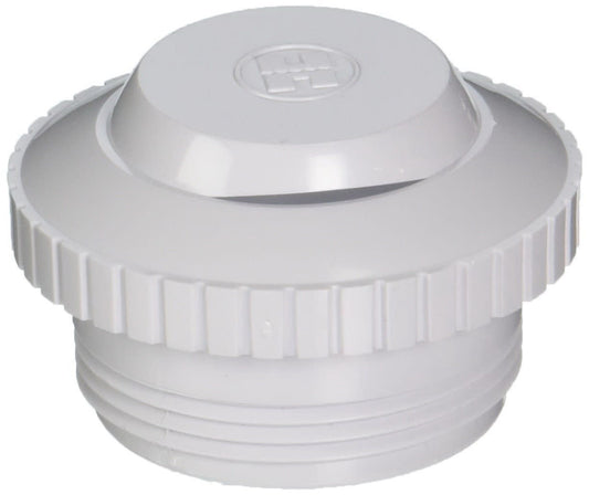 Close-up of the Hayward 1-1/2" Hydrosweep Slotted Eyeball Fitting's white screw-on lid, featuring textured edges for grip and a slotted vent, designed to integrate with inlet fittings.