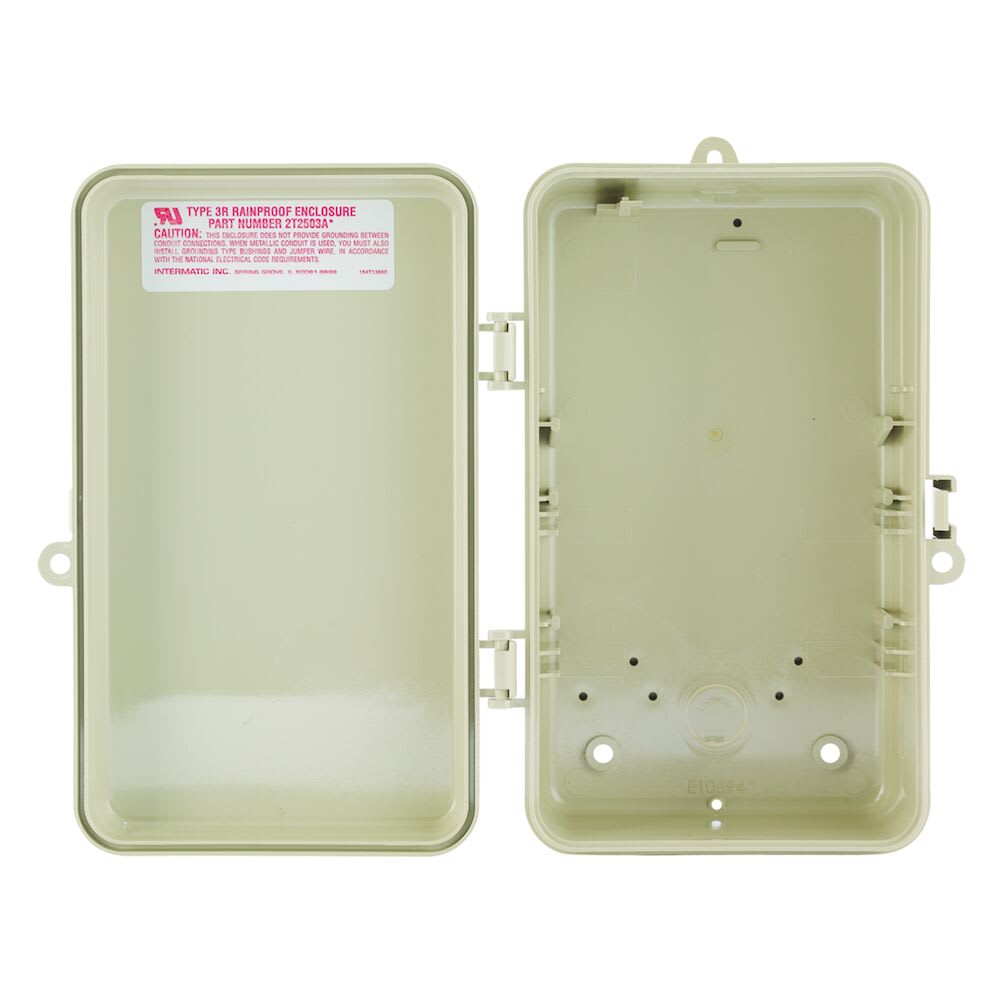 The Pool Goods Beige Plastic Case for T100R Series, model 2T2502GA, is an industrial-grade rainproof enclosure with an open door revealing an empty compartment. A small red and white caution label is visible inside the door, and it comes with mounting brackets for secure installation.