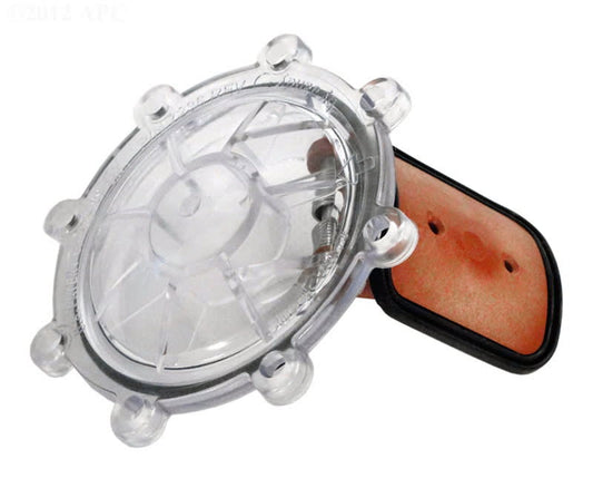 The Jandy Pro Series Check Valve Cover w/ Flapper Assembly | 7056 features a round, transparent design with a clear cover and multiple ridges, mounted on a rectangular orange and black base.