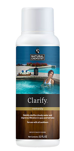 A white 32 oz NaturalChemistry Spa Clarify Clarifier (14233NCM) bottle features a woman relaxing in a spa on the label, highlighting enhanced water clarity for spas and hot tubs.