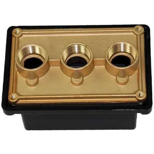 The Pentair Brass Base Junction Box (78310600) features a metallic base with three evenly spaced 3/4" ports, encased in a sleek black polycarbonate cover, designed for niche applications.