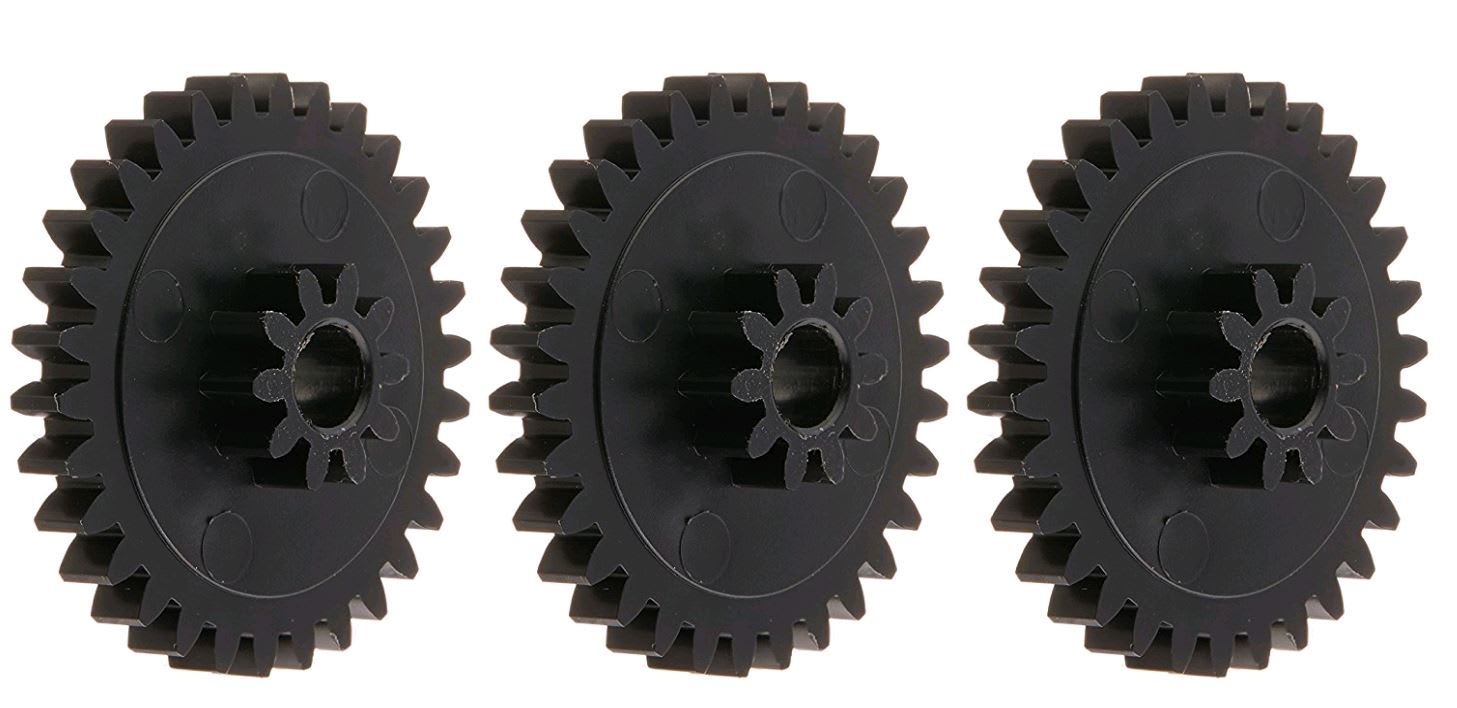 Three black plastic spur gears with a central hole, aligned in a row on a white background. This Pentair Great White Idler Gear Kit (GW9509) ensures your suction-side pool cleaner, such as the Kreepy Krauly, runs smoothly and efficiently.