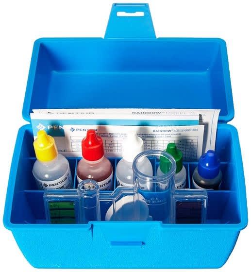The Pentair All-in-One Four Way Test Kit (R151186) is a blue plastic case with reagents, test tubes, and instructions inside—ideal for easy chlorine testing and pool maintenance. Brand: Pentair.