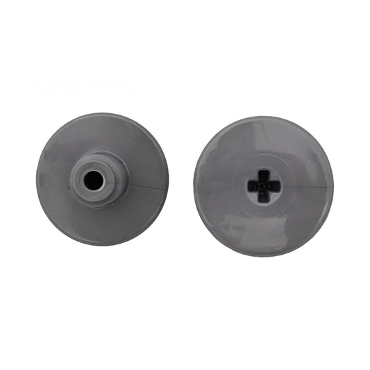 Two round, gray plastic caps are shown side by side—one with a central hole and one with a cross-shaped opening—perfect as Polaris Quattro Sport Retainer Screw replacements (Polaris, 2/Pack, R0838800).