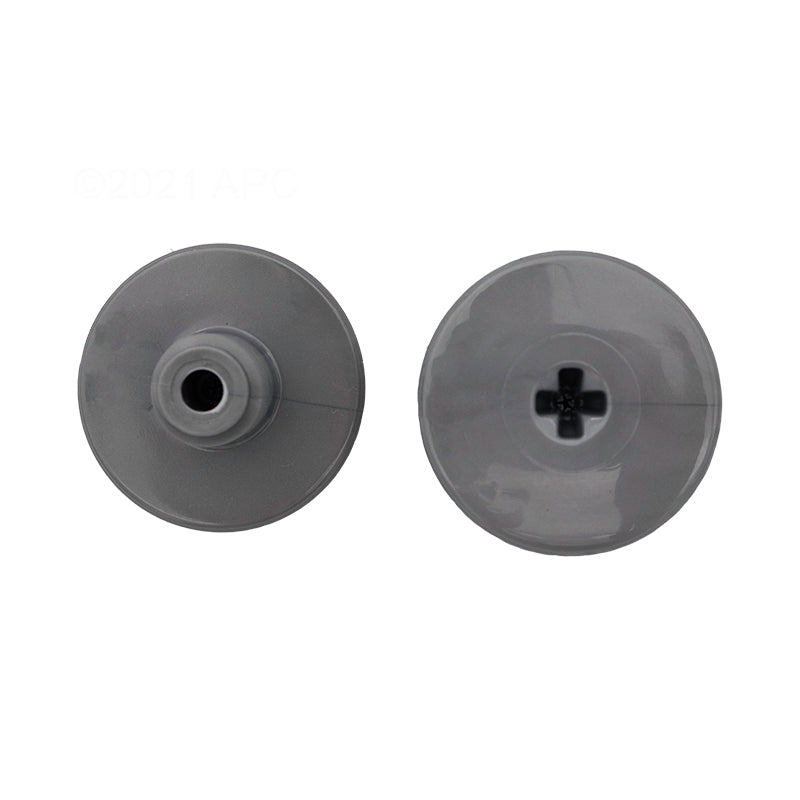 Two round, gray plastic caps are shown side by side—one with a central hole and one with a cross-shaped opening—perfect as Polaris Quattro Sport Retainer Screw replacements (Polaris, 2/Pack, R0838800).