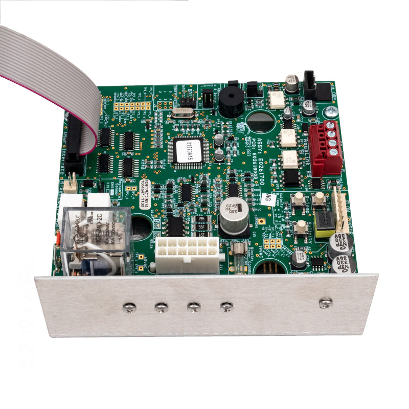 The Jandy Power Interface Board Assembly (R0984100) for AquaPure Salt Water Pool Systems features multiple chips, connectors, and components on a metal mounting plate, with a ribbon cable attached on the left side.