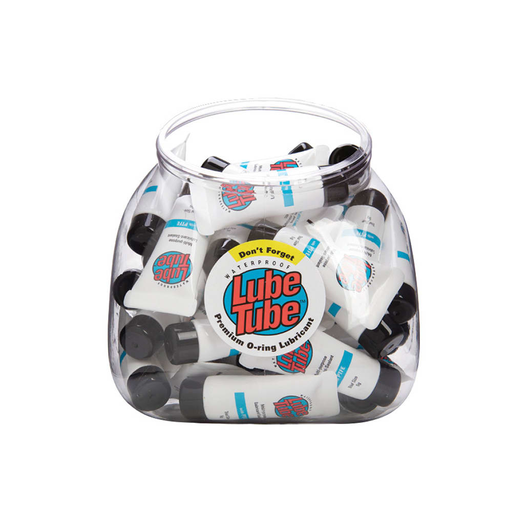 A clear plastic jar holds 100 trial-sized (5g) Lube Tube O-Ring Lubricant tubes by Pool Goods, each with black caps and white labels, formulated with a PFTE barrier for superior protection. Product code: 00550.
