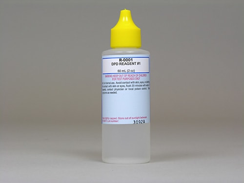 A clear bottle with a yellow cap labeled "Taylor DPD Reagent #1 Dropper Bottle, 2 oz (R-0001-C-12)," ideal for testing pool water chlorine levels.