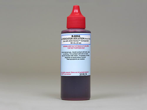 The Taylor 2000 Series pH Indicator Reagent comes in a 2 oz bottle with a red cap, designed for pool and spa use. It includes cautionary usage instructions.