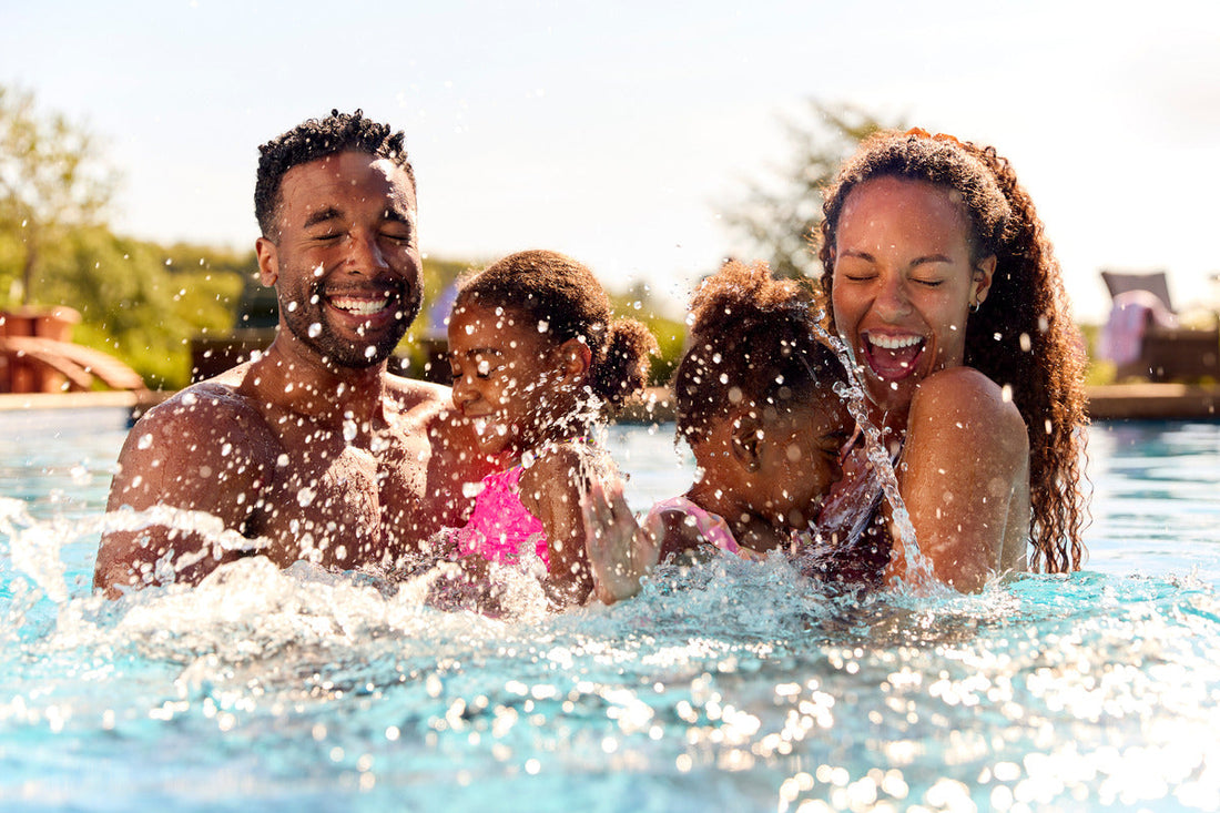 A family enjoying time in the pool.