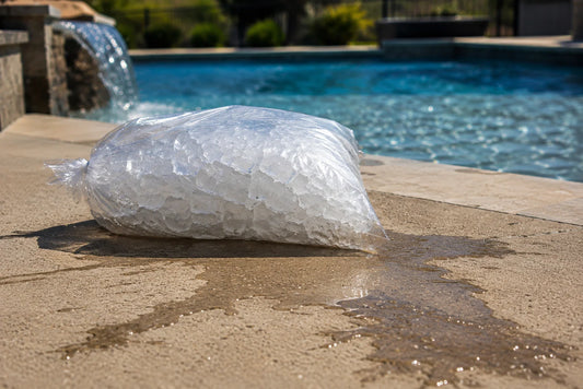 Bag of ice melting on a hot pool deck. 
