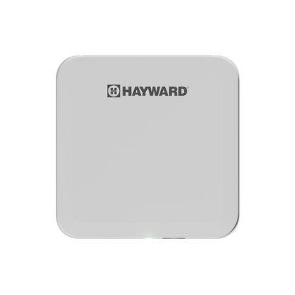 The Hayward OMNIX GATEWAY W3GATEWAYX1 is a square, white device with rounded corners and the HAYWARD logo in black on the front, designed for remote access to pool equipment.
