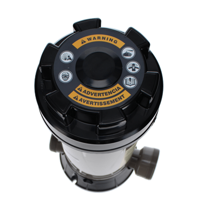 The Hayward CL200 Automatic Chlorinator features a cylindrical housing with a black lid and multilingual warning icons. It's essential for pool construction, effectively housing brominators or automatic chlorinators to ensure safe water treatment.
