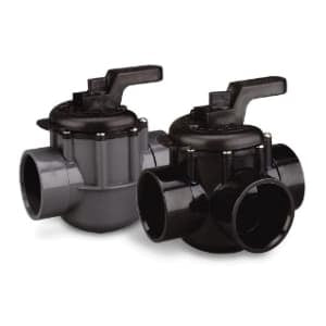 The Pentair 2" 3-Way Compool PVC Valve | 263028 features dual black plastic plumbing valves with lever handles, automated operation, and multiple pipe connections.