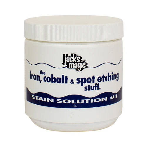 White container labeled "Jacks Magic Stain Solution #1 The Iron, Cobalt & Spot Etching Stuff" features a non-acidic formula to effortlessly tackle tough pool stains.